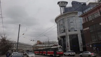Угол Новослободской, Лесной и Палихи: справа — БЦ «Чайка Плаза 7». Фото: karel291, 2015. Лицензия Wikimedia Commons: CC BY 3.0.